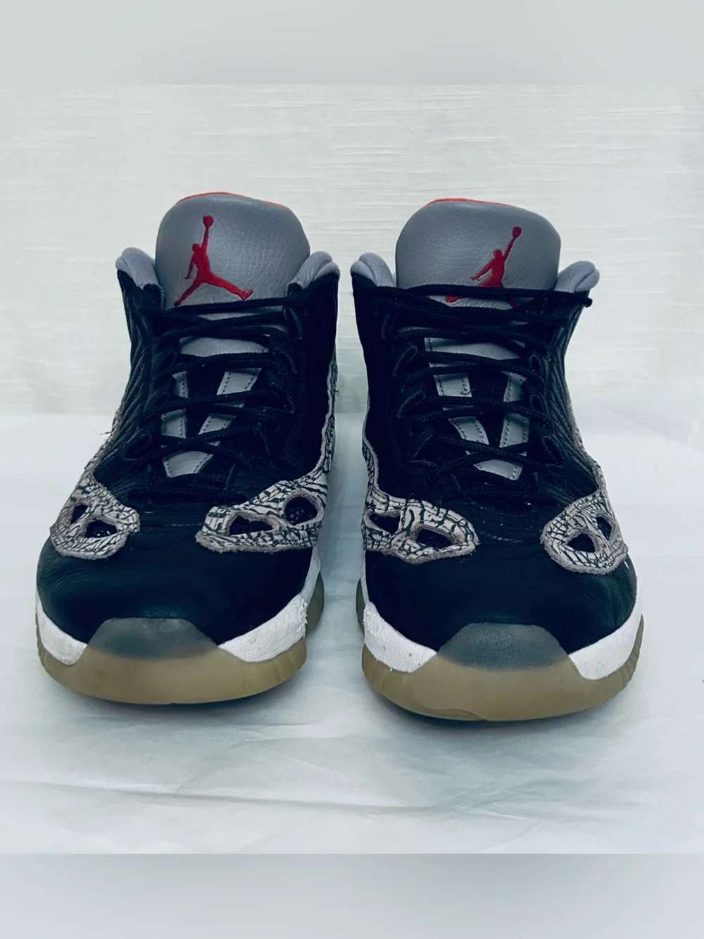 Air Jordan 11 Retro Low IE‎ Men's Black/Grey Sneakers with Red Jumpman Accents